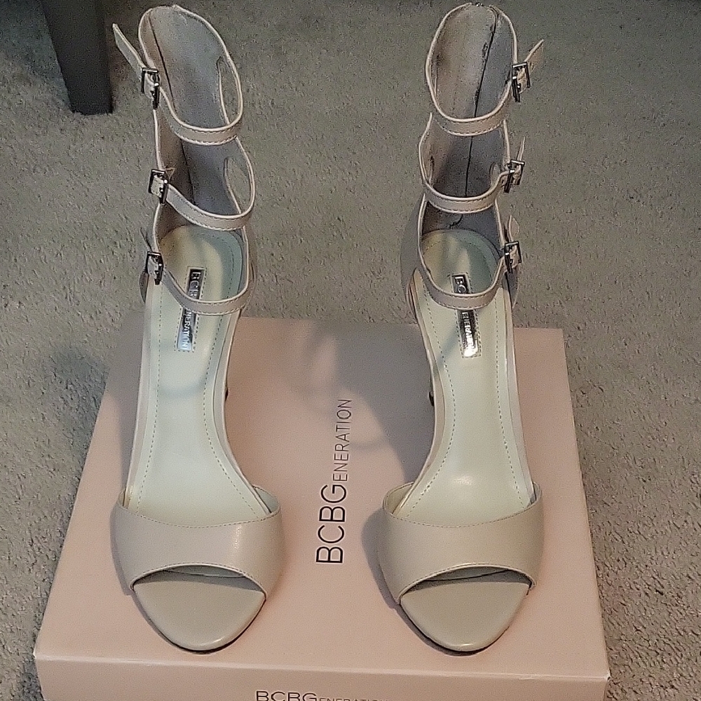 BCBGeneration Women's Cream Buckle Heels Chevonne